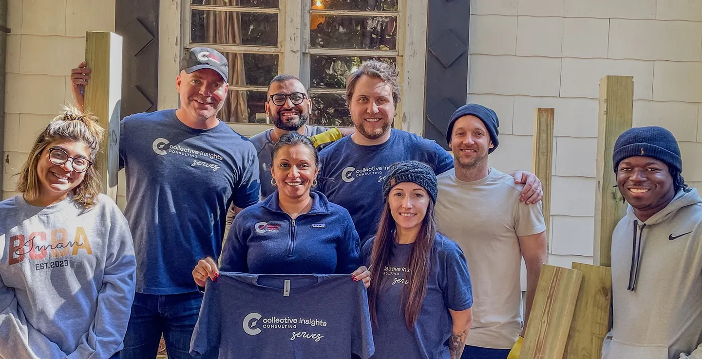 Collective Insights Teams members at a company event.
